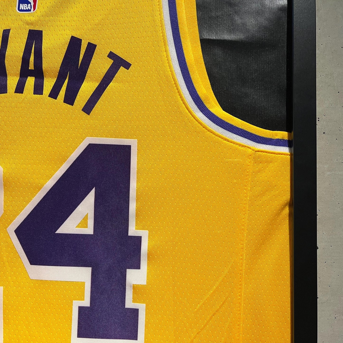 a basketball jersey with the number four on it