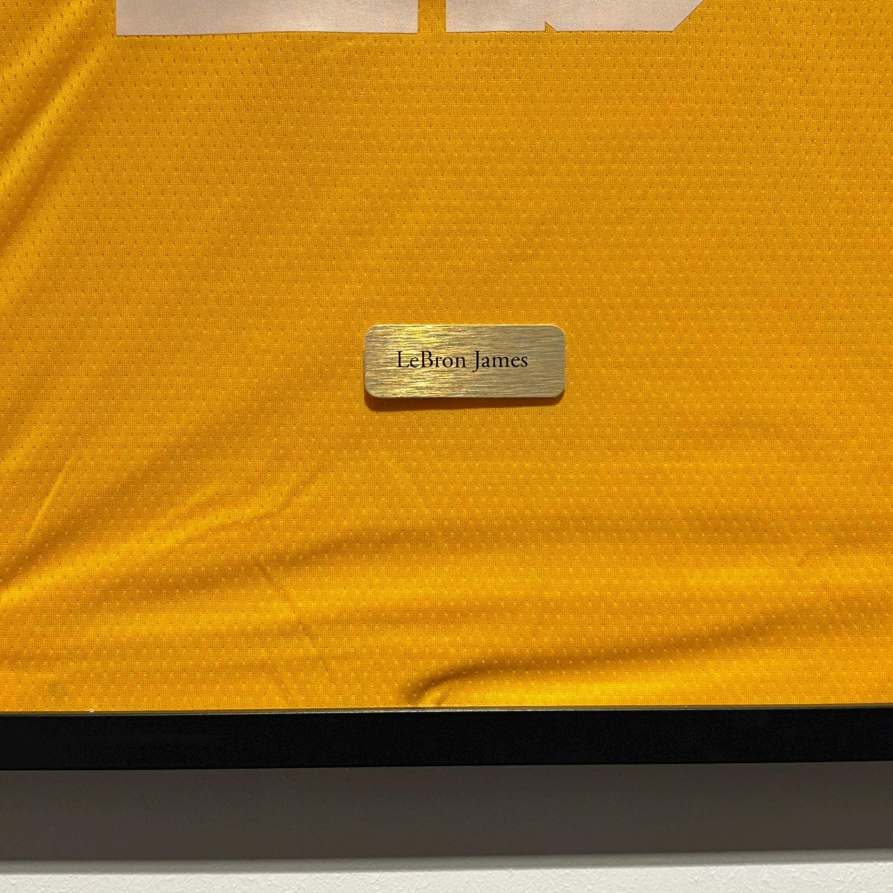 a close up of a soccer jersey with a name tag